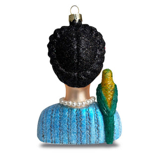 Frida and her Parrot Glass Ornament - Holt x Palm -  This Frida and her Parrot Glass Ornament is the perfect way to add some artistic flair to your holiday decor – without giving up on your refined taste. Each ornament is carefully crafted for that one-of-a-kind look – and it's so unique, you just might be singing a parrot-y version of "Deck the Halls"! Details: Beaded and glittered Handmade item Size: 5"x3.5"x1.5"